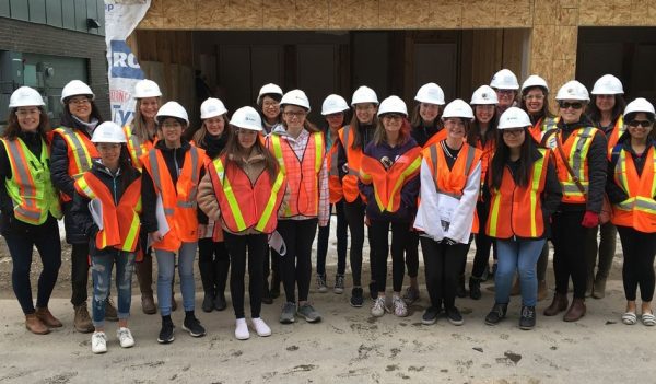 A group of girls at a construction site